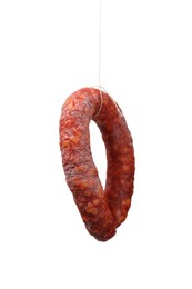 Photo of One delicious dry cured sausage isolated on white