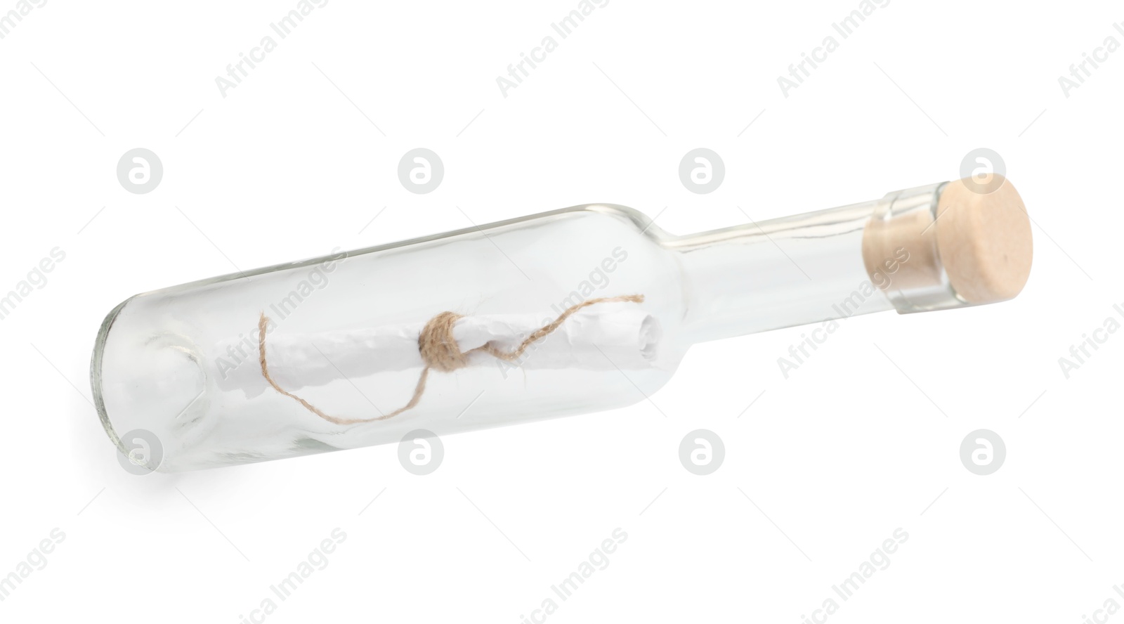 Photo of Corked glass bottle with rolled letter isolated on white