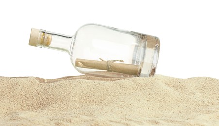 Photo of Rolled letter in corked glass bottle on sand against white background