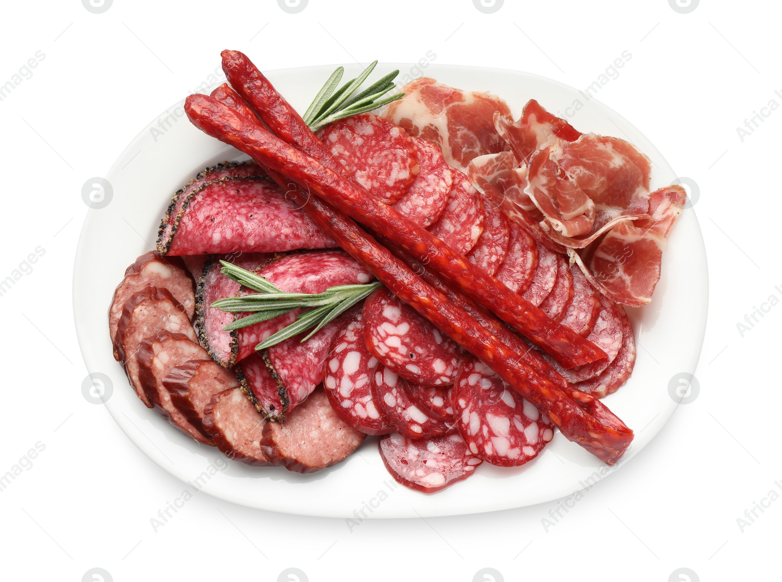 Photo of Different smoked sausages slices isolated on white, top view