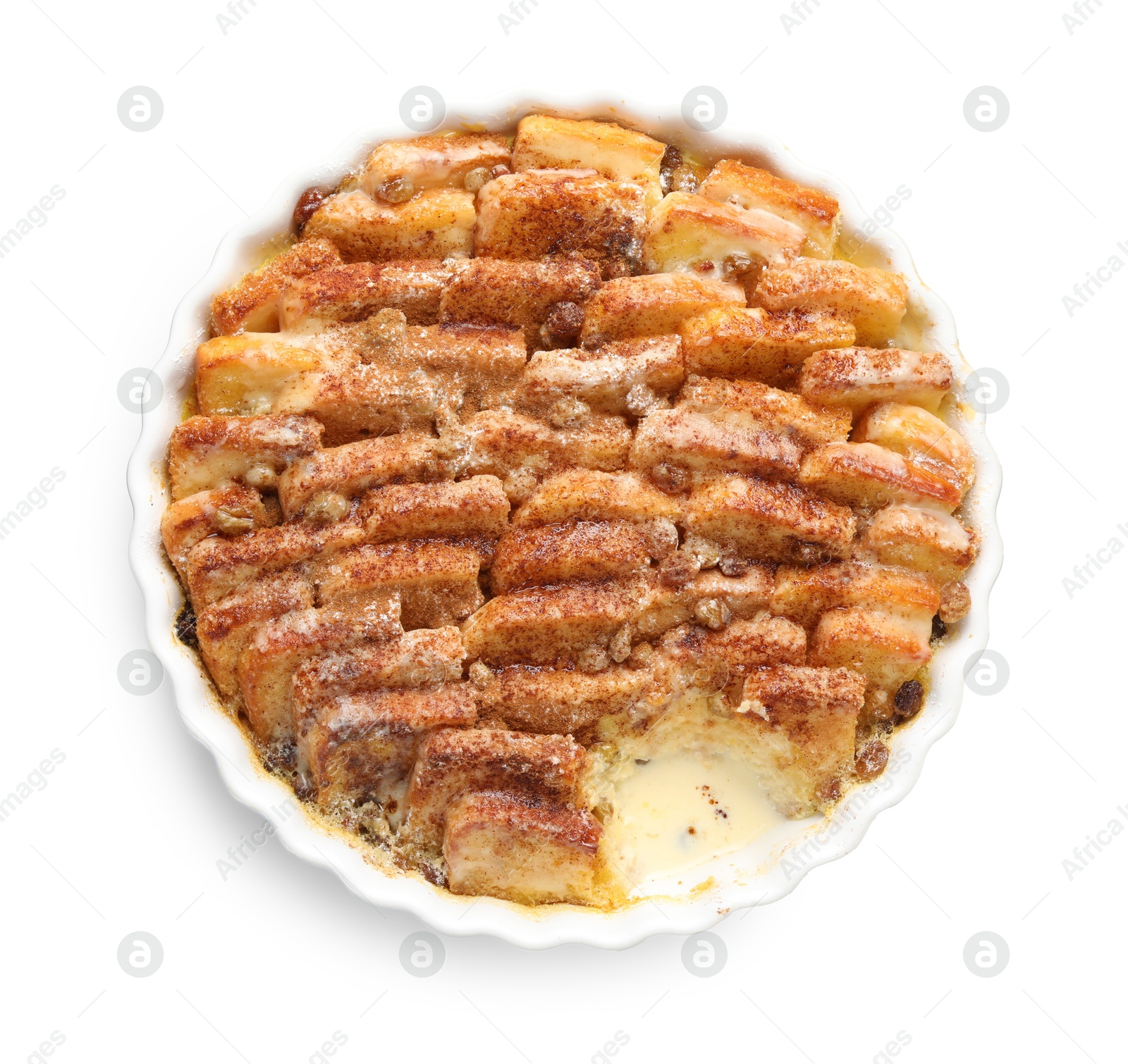 Photo of Delicious bread pudding with raisins and cinnamon isolated on white, top view