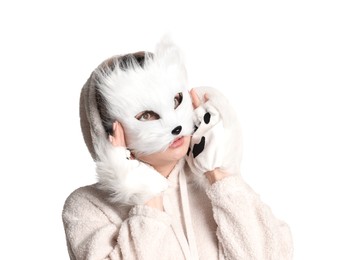 Photo of Quadrobics. Woman wearing cat mask and gloves on white background