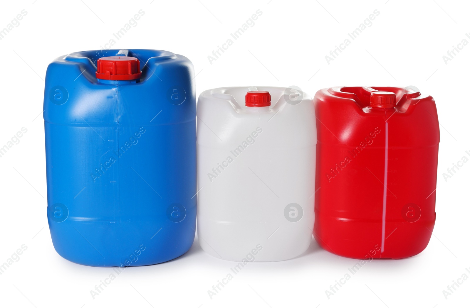 Photo of Three colorful plastic canisters isolated on white