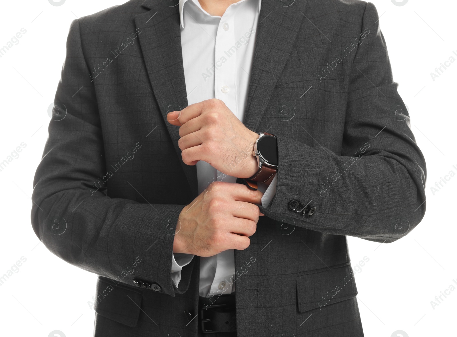 Photo of Man in classic suit with stylish watch on white background, closeup