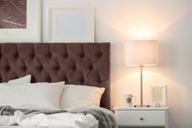 Image of Cozy bedroom interior in mocha mousse shade. Trendy color of 2025 year