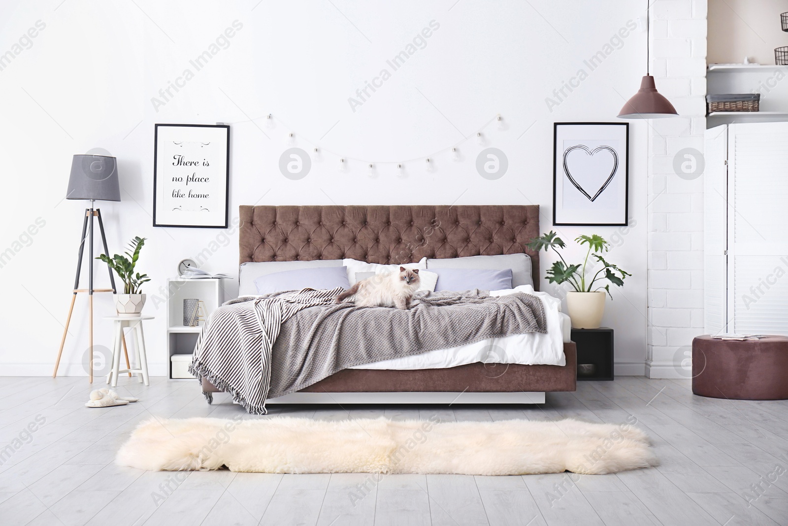 Image of Cozy bedroom interior with mocha mousse shade. Trendy color of 2025 year