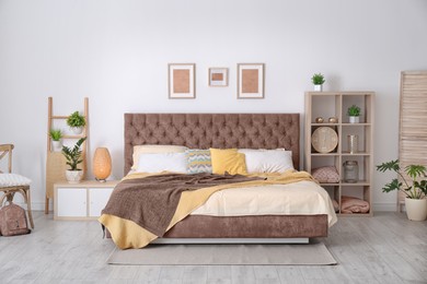 Image of Cozy bedroom interior with mocha mousse shade. Trendy color of 2025 year