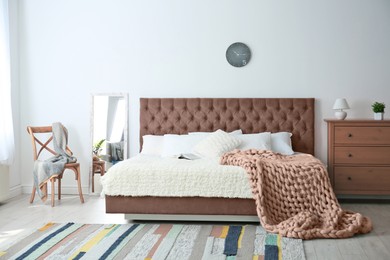 Image of Cozy bedroom interior with mocha mousse shade. Trendy color of 2025 year