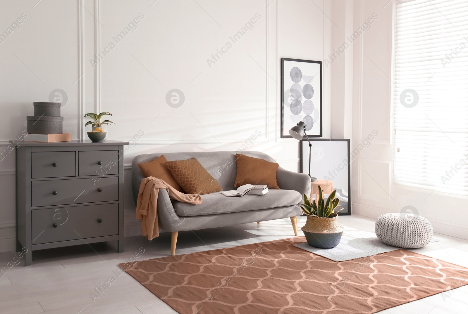 Image of Cozy living room interior. Decorative elements in mocha mousse shade. Trendy color of 2025 year