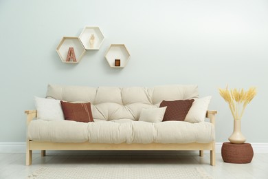 Image of Cozy living room with decorative elements in mocha mousse shade. Interior design with trendy color of 2025 year