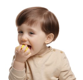 Photo of Cute little child eating tasty mochi on white background