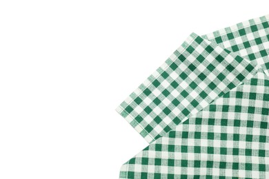 Photo of Green checkered tablecloth isolated on white, top view