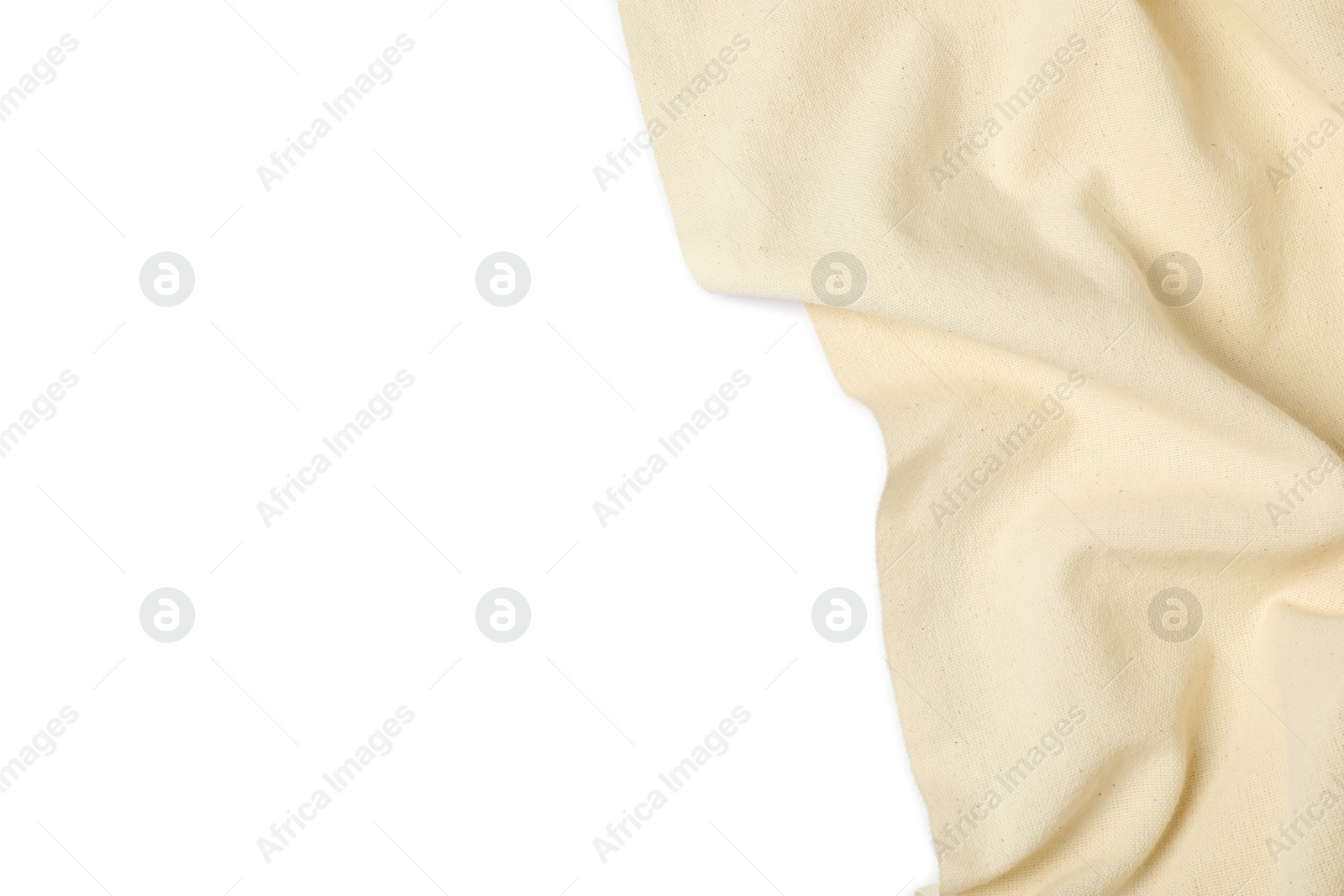 Photo of Beige tablecloth isolated on white, top view