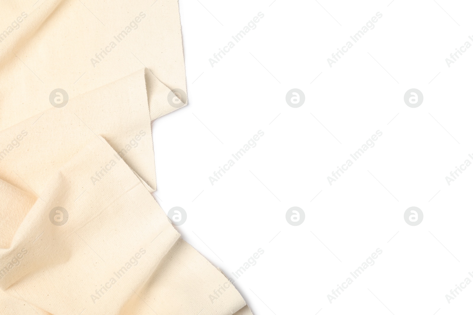 Photo of Beige tablecloth isolated on white, top view