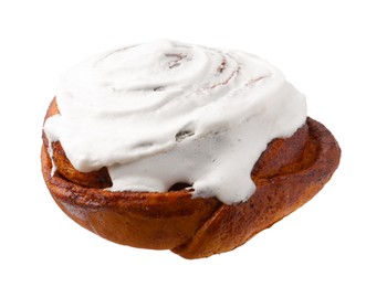 Photo of Tasty cinnamon roll with cream isolated on white