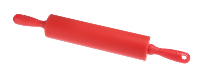 Photo of One red rolling pin isolated on white