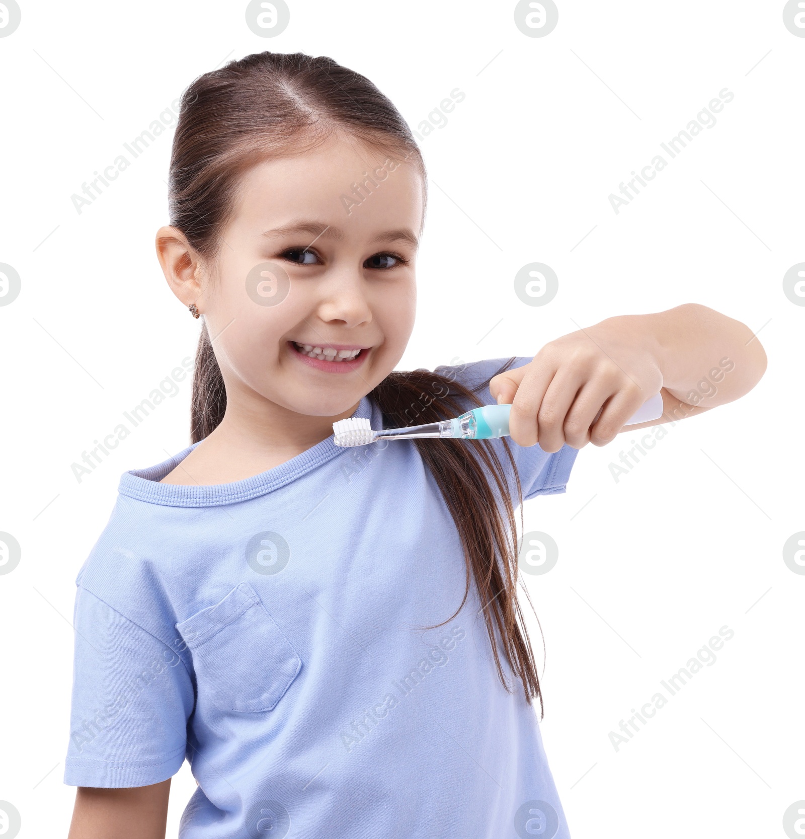 Photo of Cute girl with toothbrush on white background