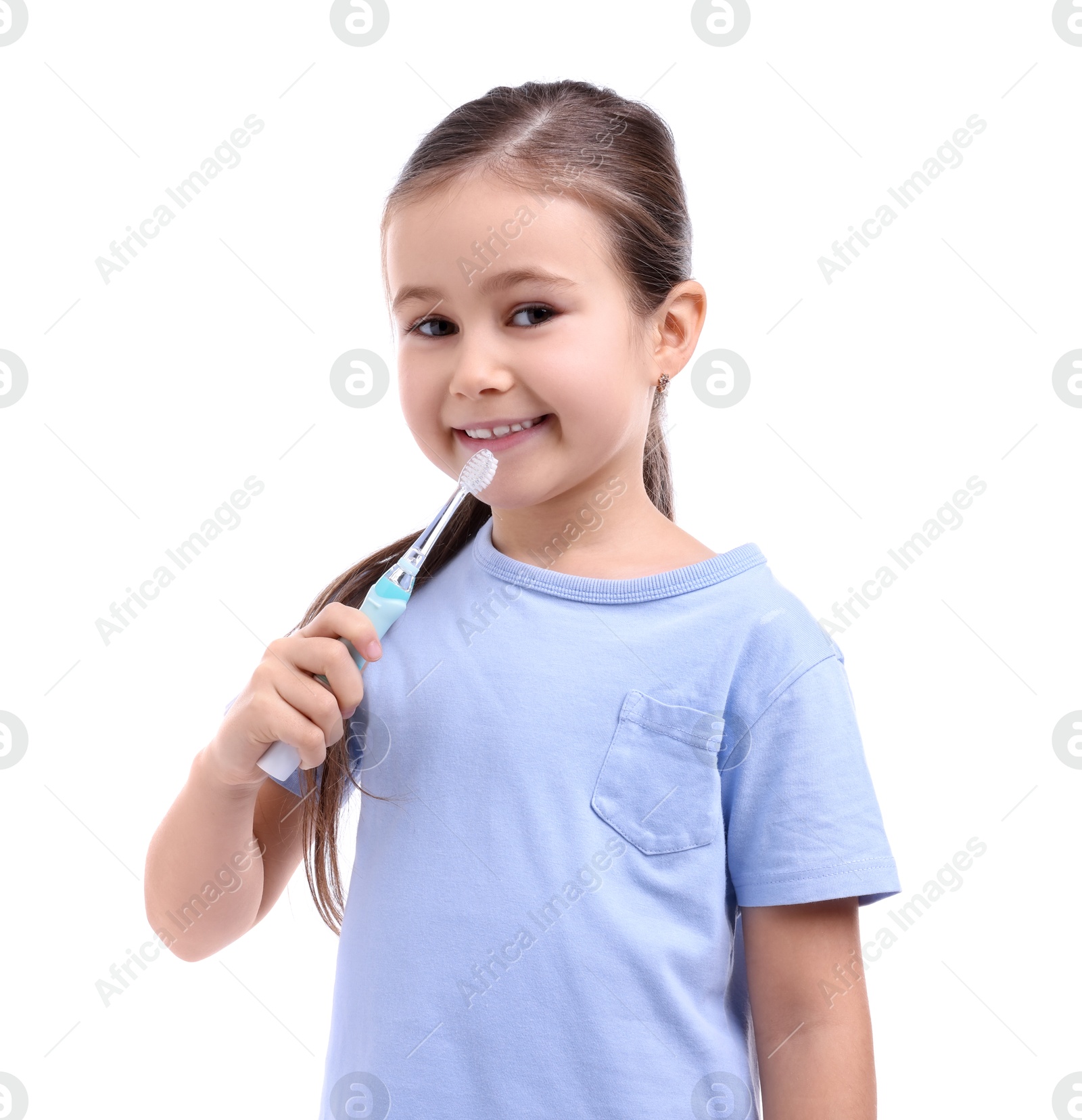 Photo of Cute girl brushing her teeth on white background