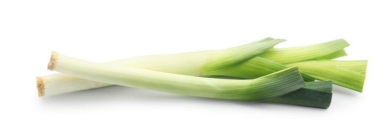 Photo of Fresh leeks isolated on white. Spicy vegetable