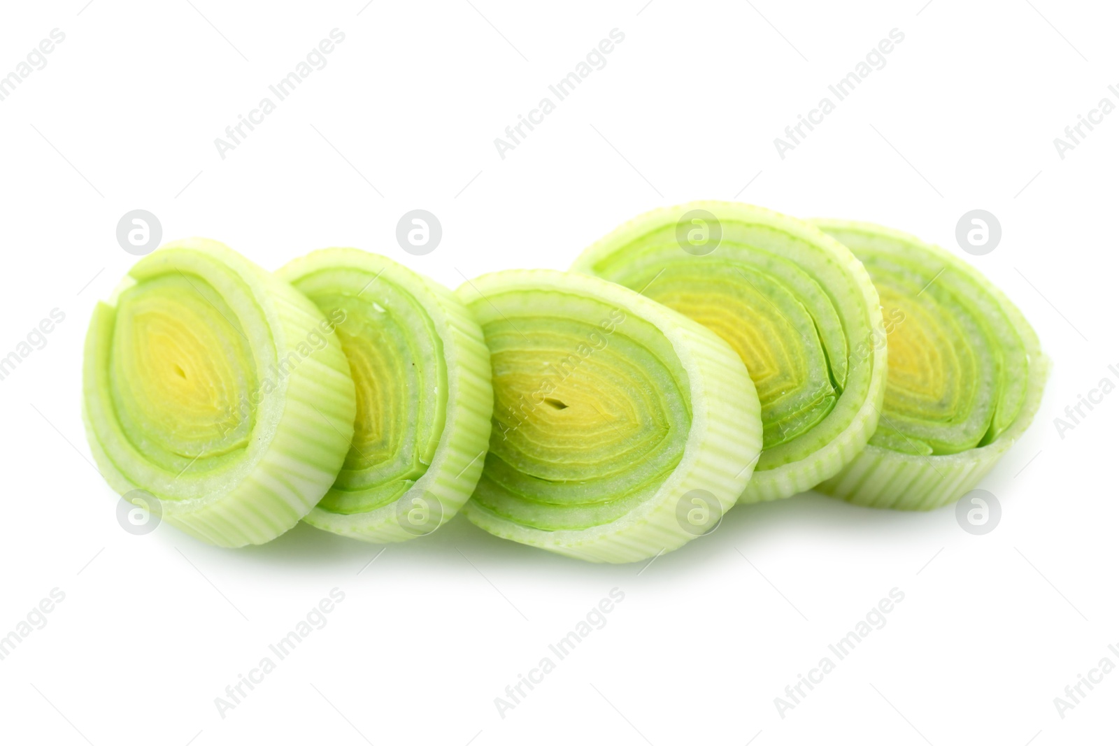 Photo of Pieces of chopped leek isolated on white