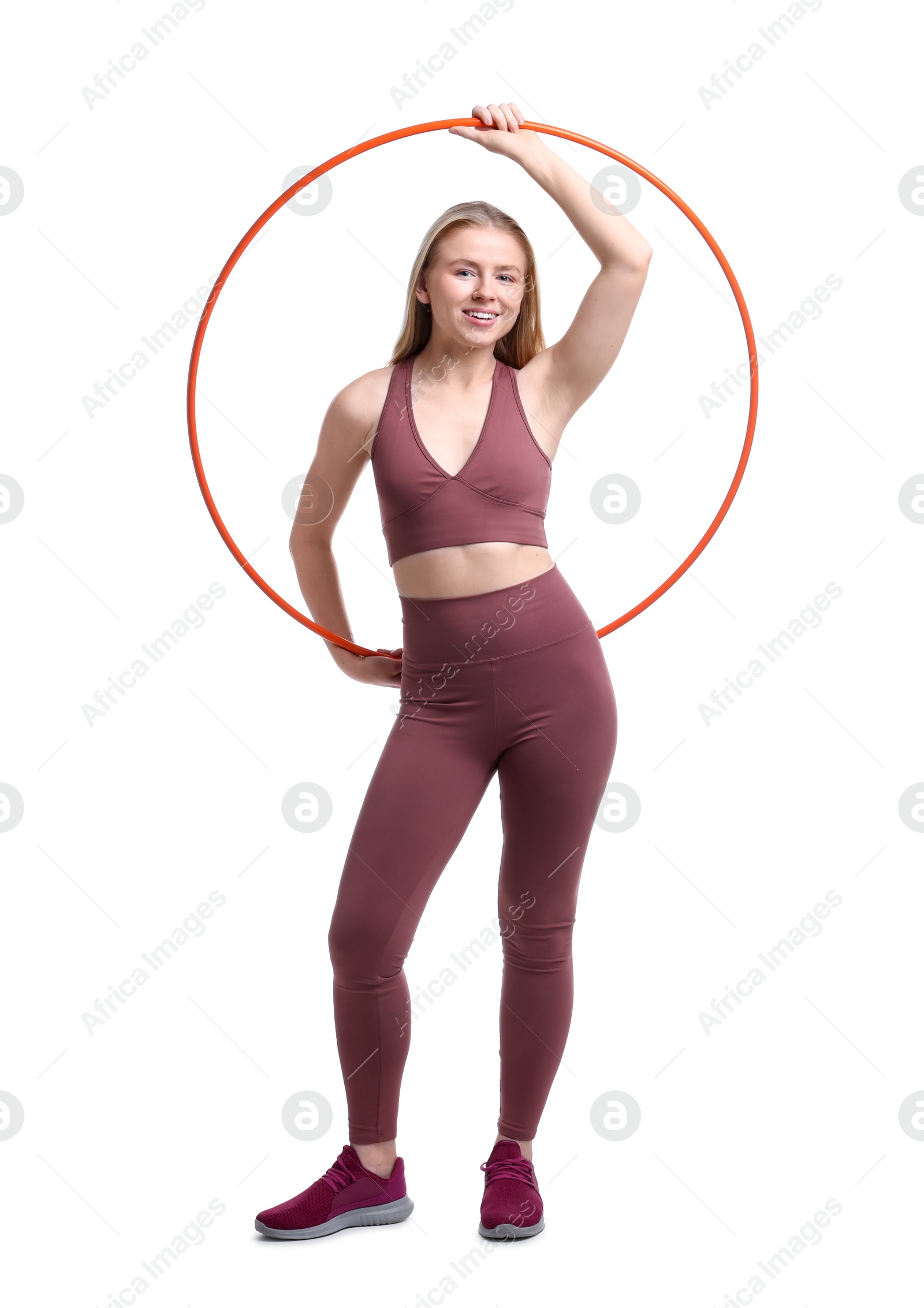 Photo of Beautiful young woman with hula hoop isolated on white