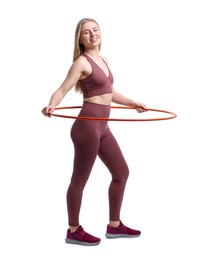 Photo of Beautiful young woman exercising with hula hoop on white background