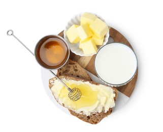 Photo of Slices of bread with butter, honey and milk isolated on white, top view