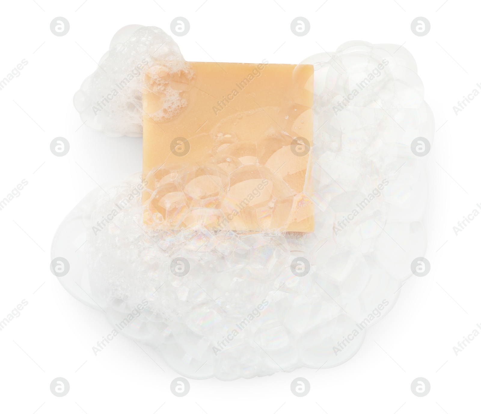 Photo of Beige soap with foam on white background, top view