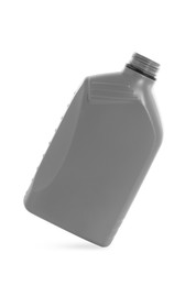 Photo of One grey plastic canister in air on white background