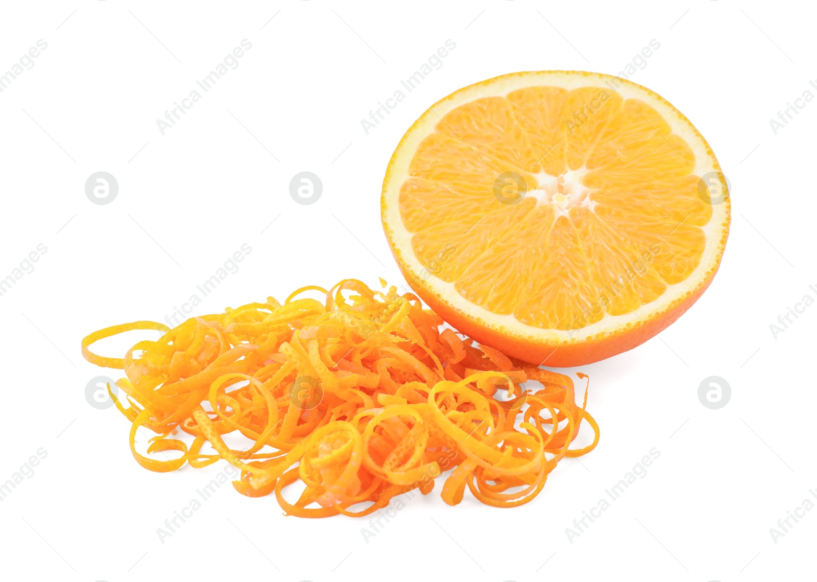 Photo of Pile of fresh orange zest and cut fruit isolated on white