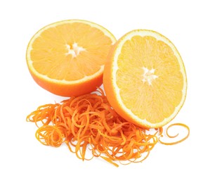 Photo of Pile of fresh orange zest and cut fruit isolated on white