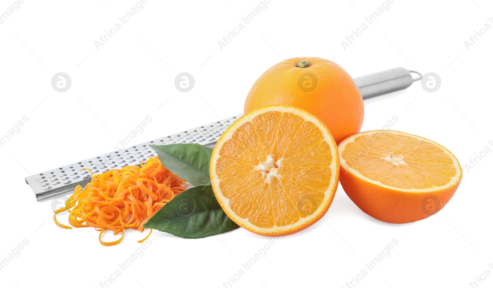 Photo of Pile of fresh orange zest, fruits, leaves and grater isolated on white