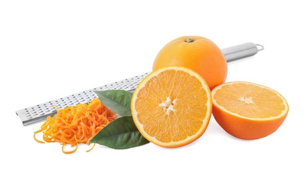 Photo of Pile of fresh orange zest, fruits, leaves and grater isolated on white