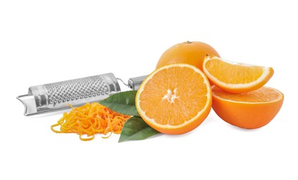 Photo of Pile of fresh orange zest, fruits, leaves and grater isolated on white