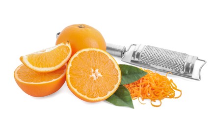 Photo of Pile of fresh orange zest, fruits, leaves and grater isolated on white