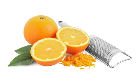 Photo of Pile of fresh orange zest, fruits, grater and leaves isolated on white