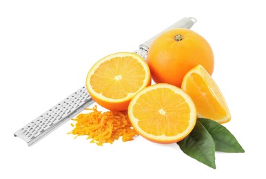 Photo of Pile of fresh orange zest, fruits, grater and leaves isolated on white