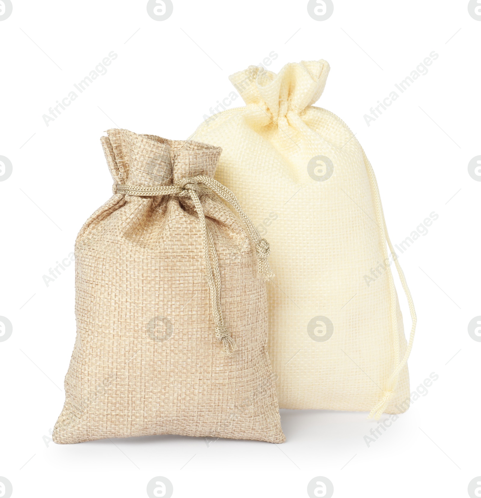 Photo of Two beige burlap sacks isolated on white