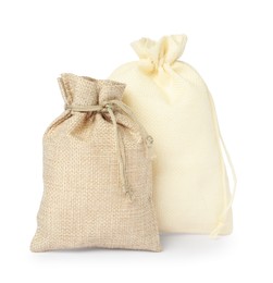 Two beige burlap sacks isolated on white