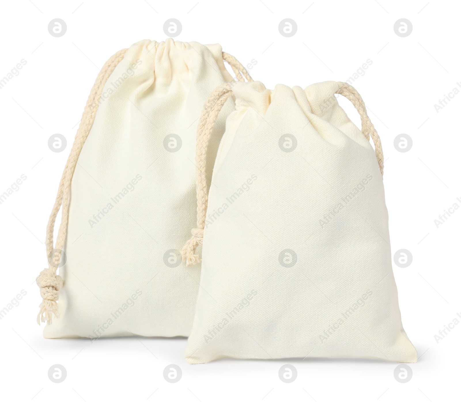 Photo of Two cotton bags with ties isolated on white