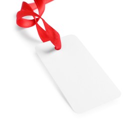 Photo of Blank tag with ribbon isolated on white