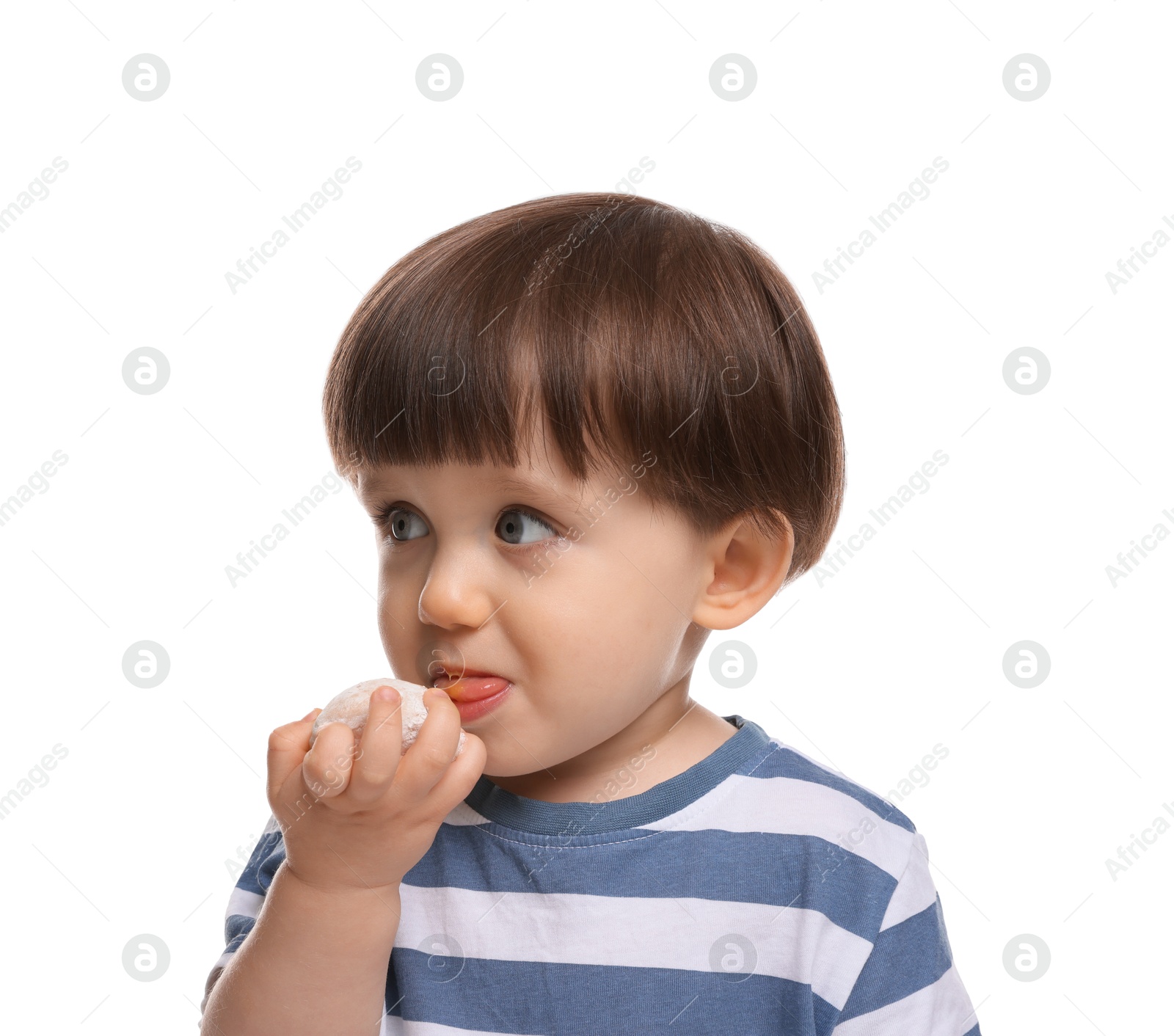 Photo of Cute little child eating tasty mochi on white background