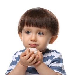 Photo of Cute little child eating tasty mochi on white background