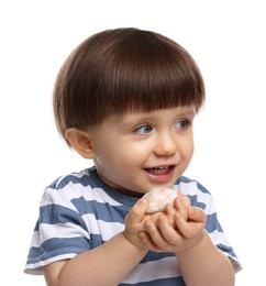 Photo of Cute little child eating tasty mochi on white background