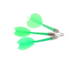 Photo of Green dart arrows isolated on white. Sports equipment