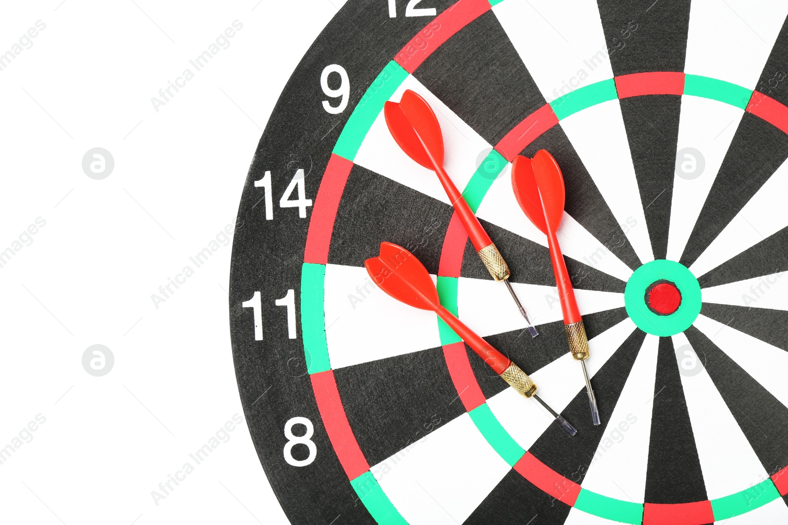 Photo of Dartboard and arrows on white background. Sports equipment