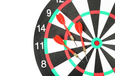 Photo of Dartboard and arrows on white background. Sports equipment