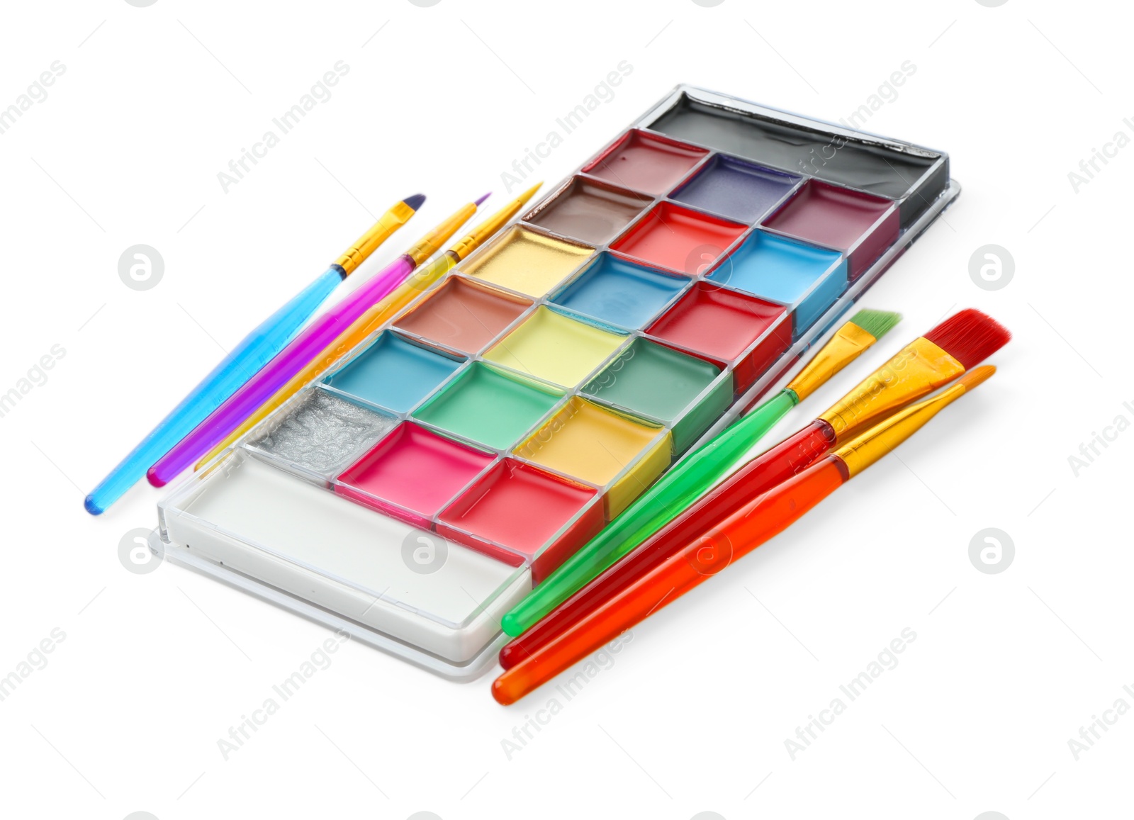 Photo of Bright face paint palette and brushes isolated on white