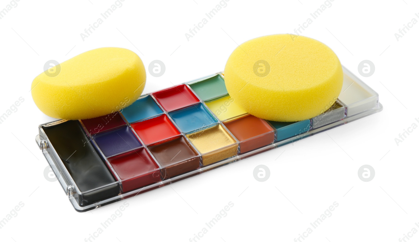 Photo of Bright face paint palette and sponges isolated on white