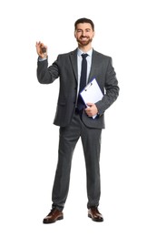 Photo of Cheerful salesman with car key and clipboard on white background